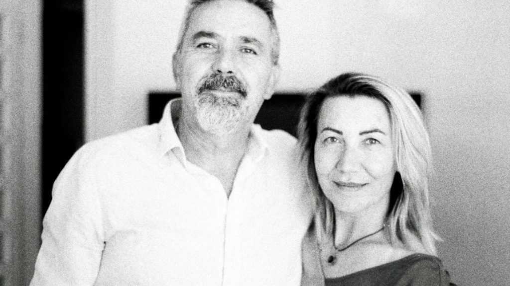 a black and white photo of a man and a woman